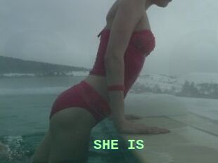 SHE_IS